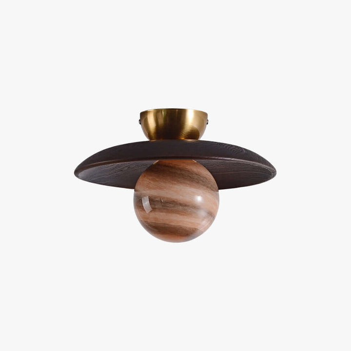 Brown Zolira ceiling light with a dark wood canopy and amber art glass globe on a white background