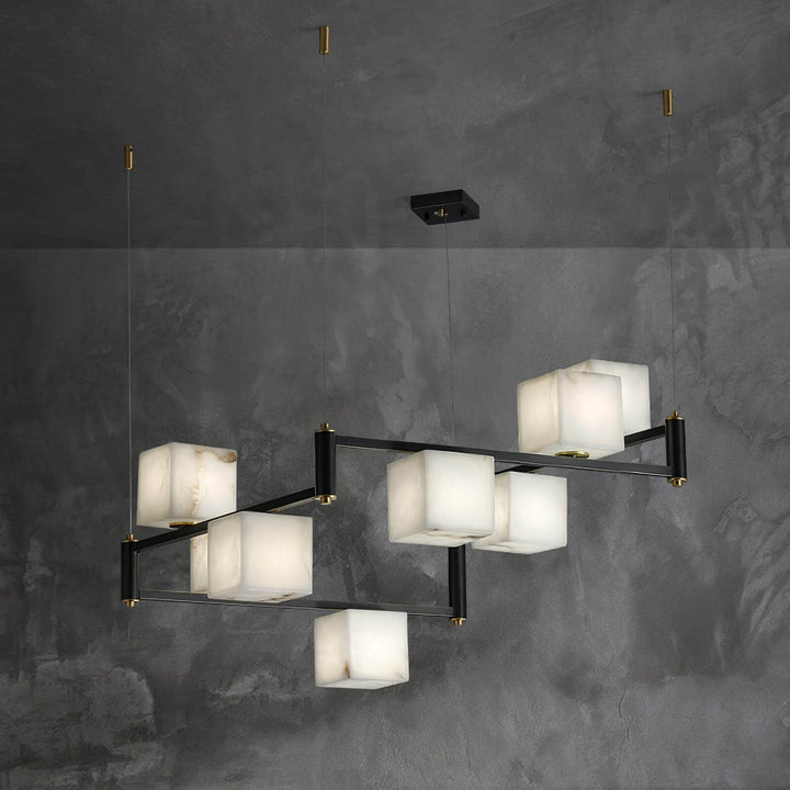 Alabaster square box chandelier showcasing mid-century modern design with multiple illuminated cubes.