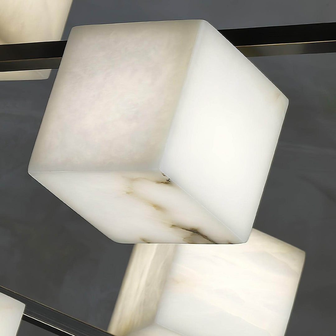 Close-up of an alabaster square box chandelier showcasing its unique patterns and mid-century modern design.