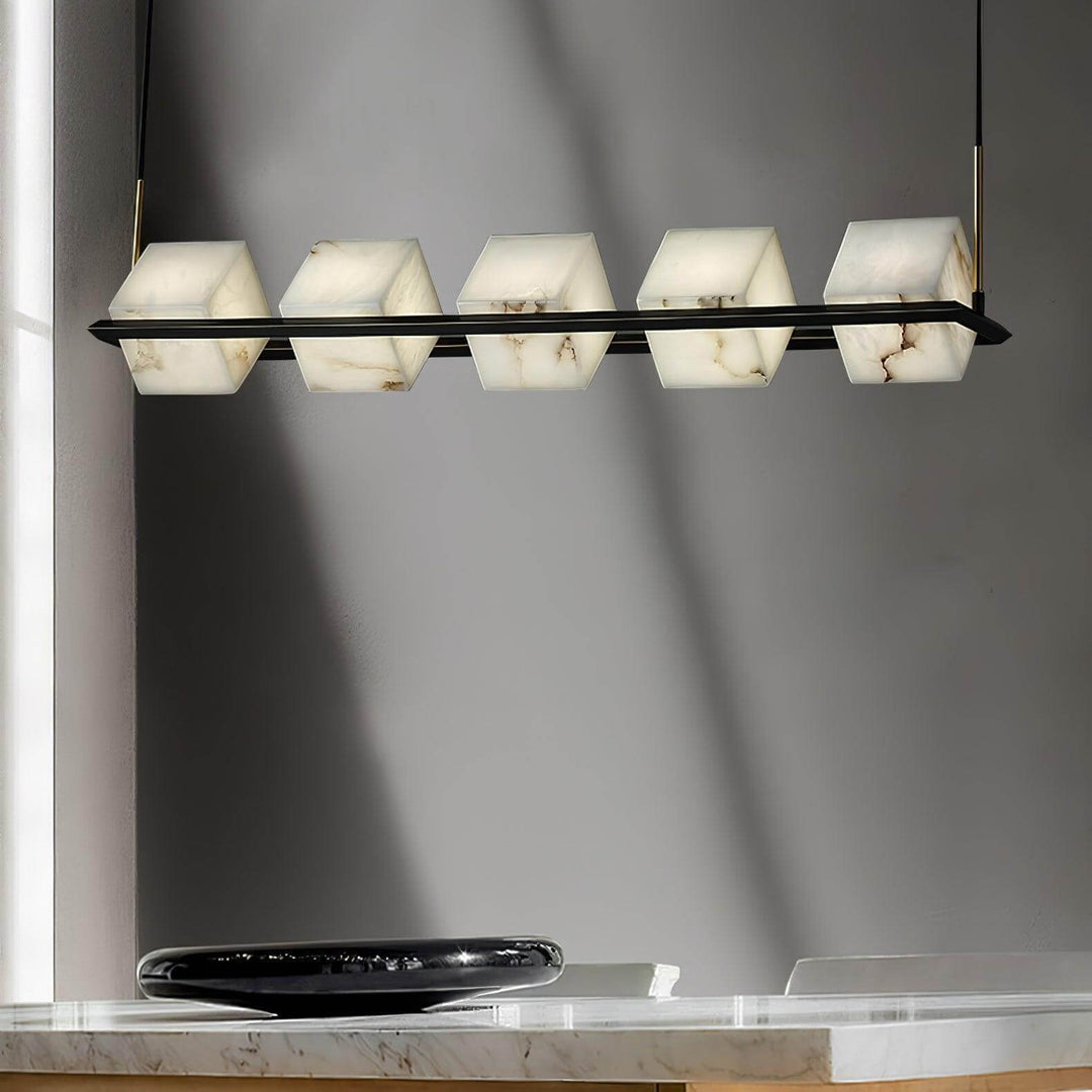 Mid-century modern alabaster square box chandelier with five light heads in stylish interior setting.
