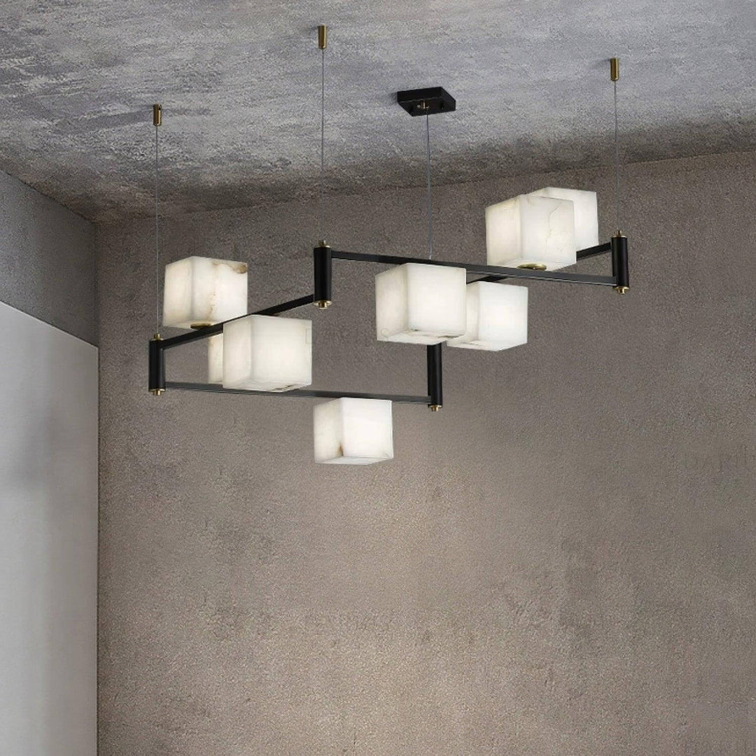 Stylish mid century modern alabaster square box chandelier with multiple light heads in a contemporary setting.