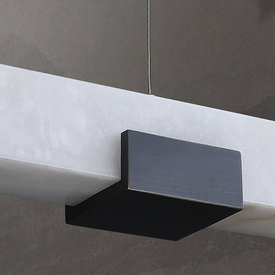 Cary Alabaster Pendant Light featuring a contemporary design with sleek black accents and unique alabaster patterns.